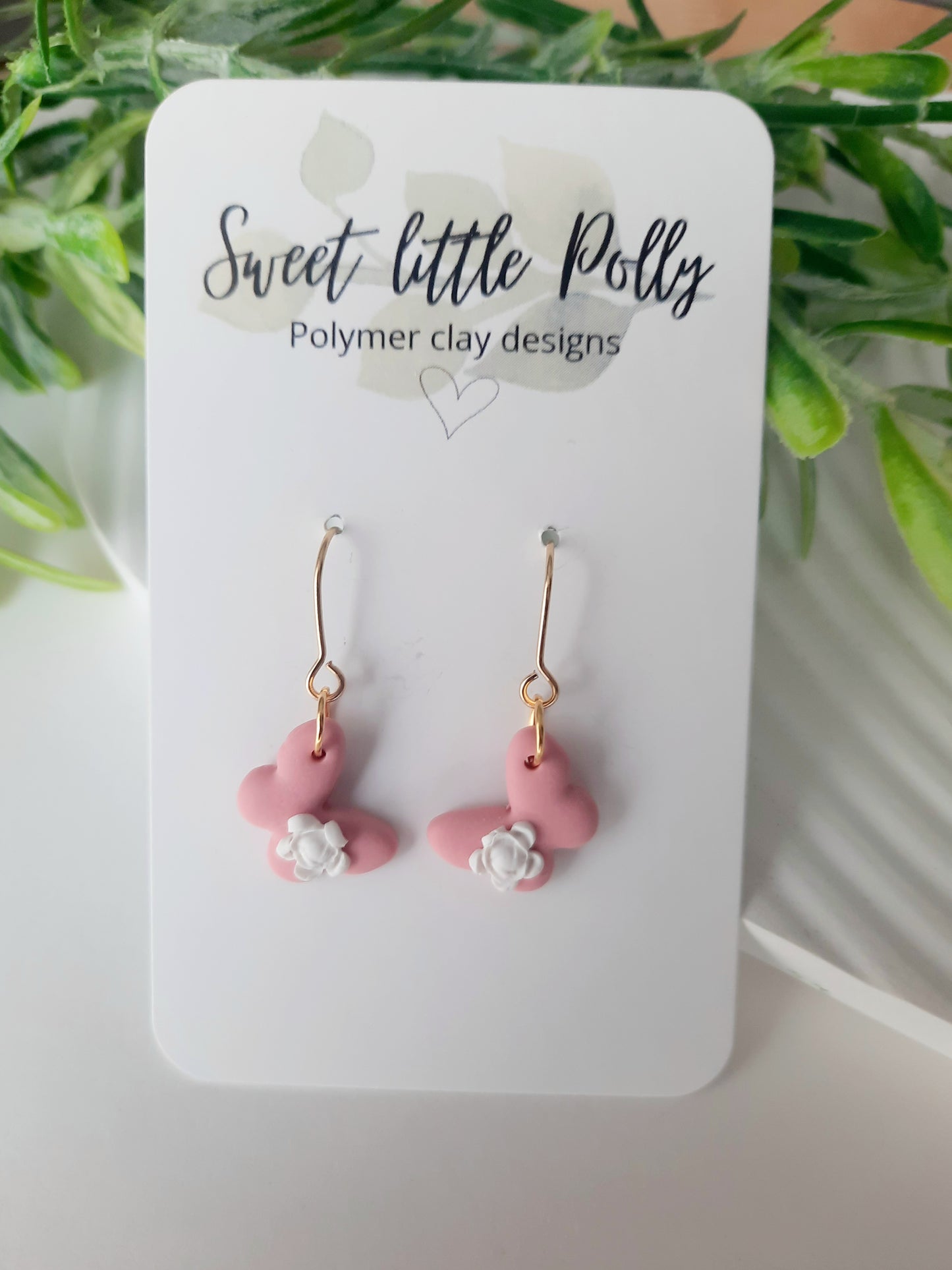 .Dainty Butterfly with Delicate Flower