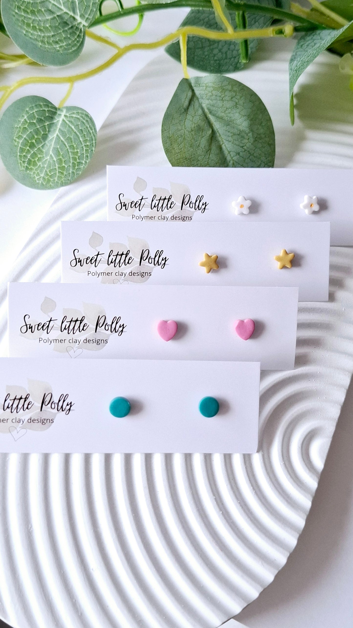 .Teeny Tiny Stud Earrings