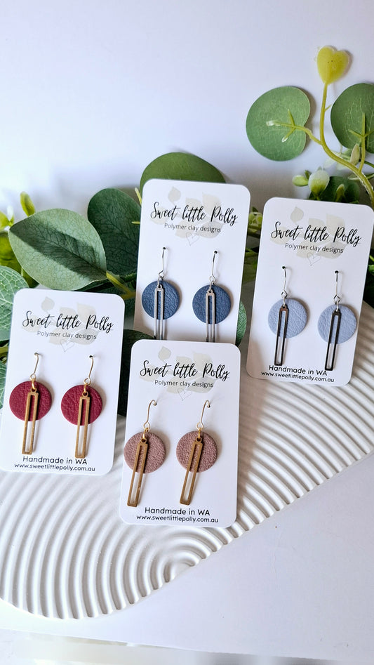 .Elegant Disc Dangle Earrings with bar accent charm.