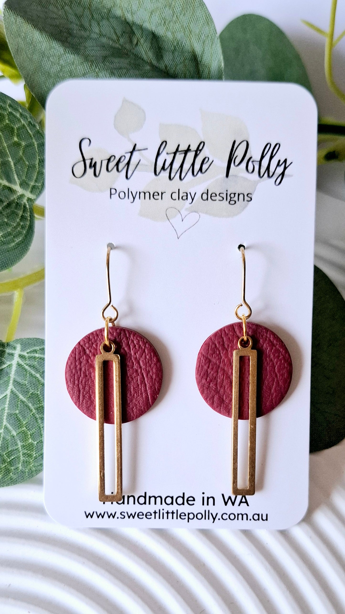 .Elegant Disc Dangle Earrings with bar accent charm.