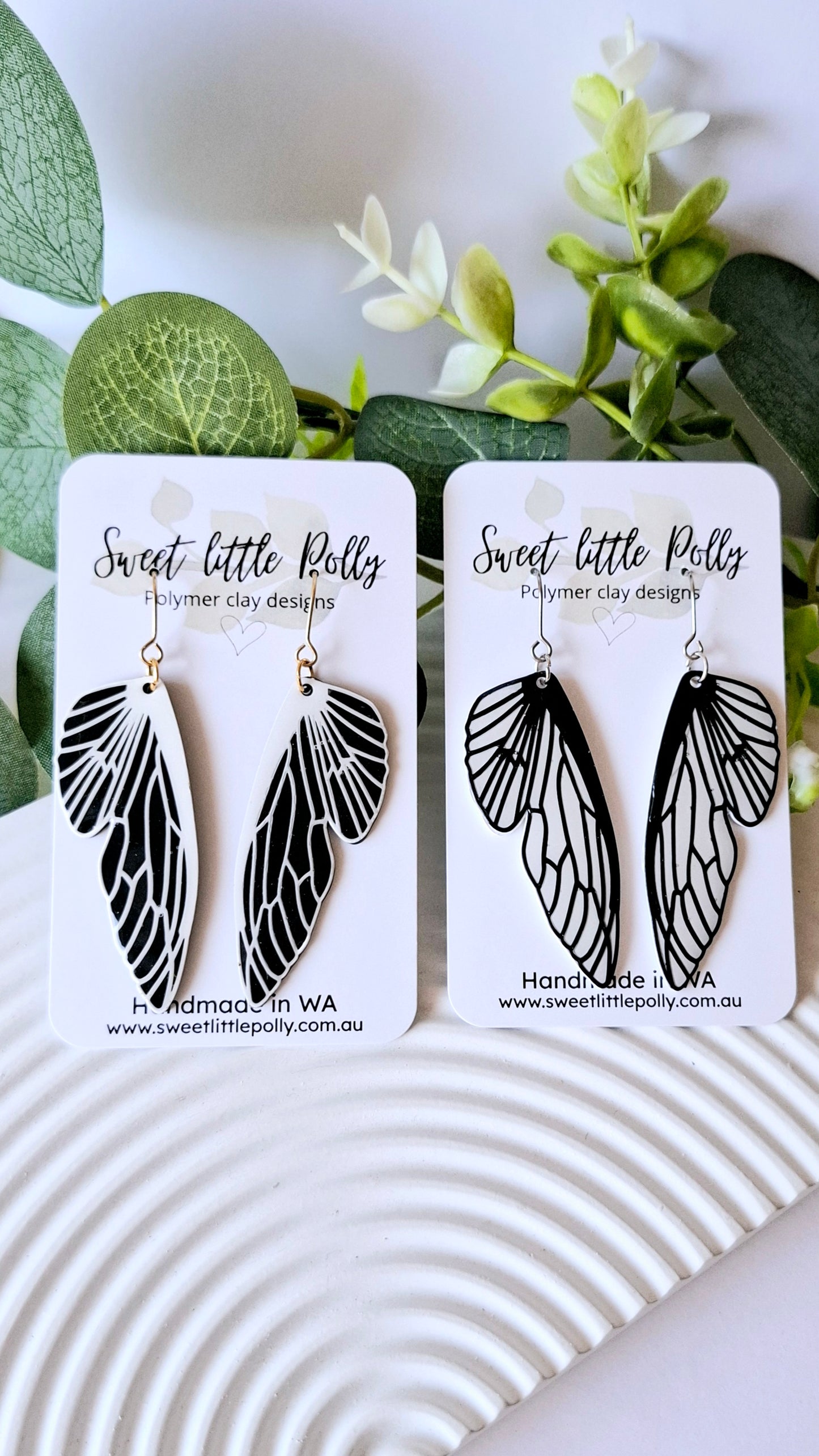 .Striking Black and White Butterfly Wing Earrings